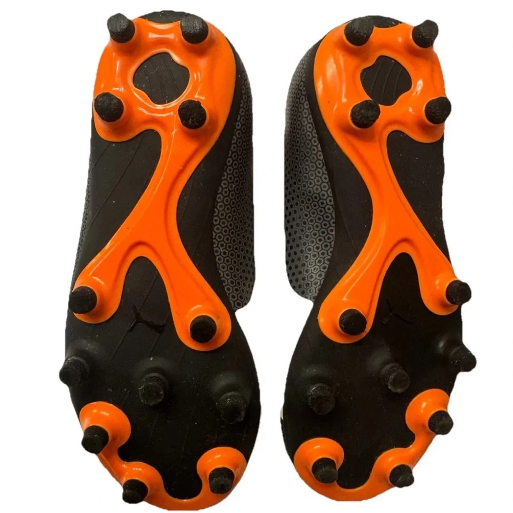 PUMA Kid’s Cleats in orange‎ and black
